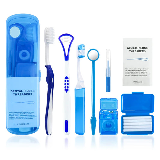 Dental care product set with toothbrushes, floss threaders, and mirror on a white background