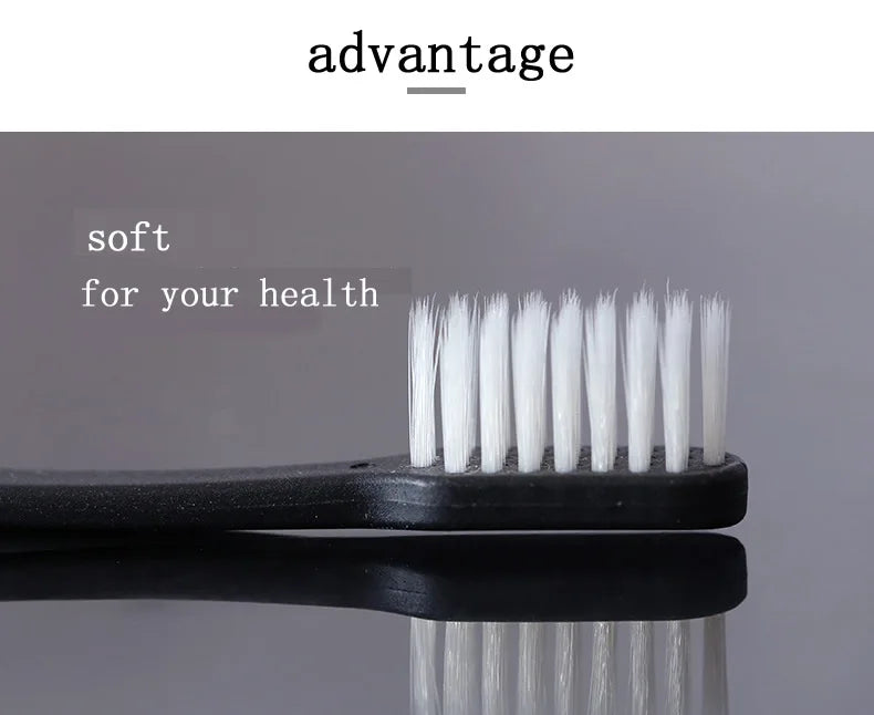 Black toothbrush with white bristles on a gray background, featuring the word 'advantage'.