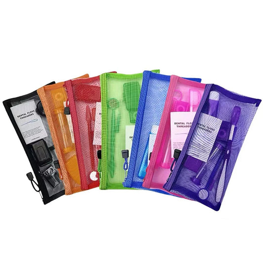 Orthodontic brush kit with colorful cases on a white background