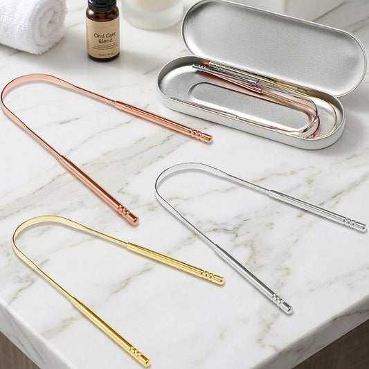 Set of metal straws in rose gold, silver, and gold on a marble surface with a carrying case.